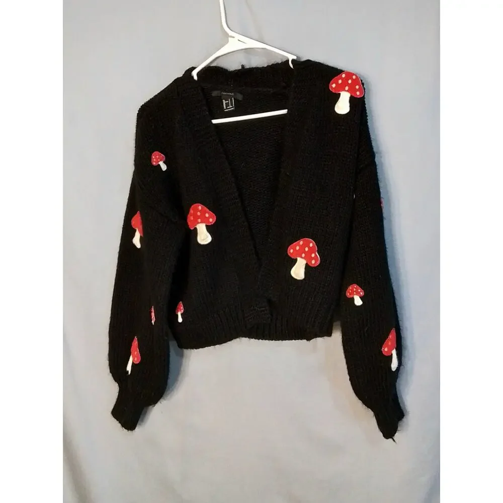 Forever 21 black sweater with red mushrooms.